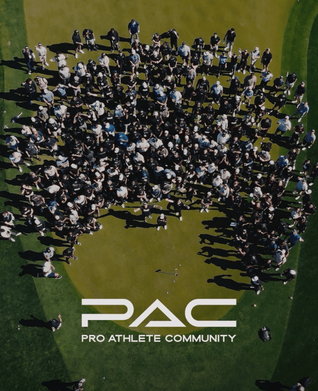 A drone picture of a crowd of people on a golf green arrayed in a horseshoe shape with the PAC Combine logo below.