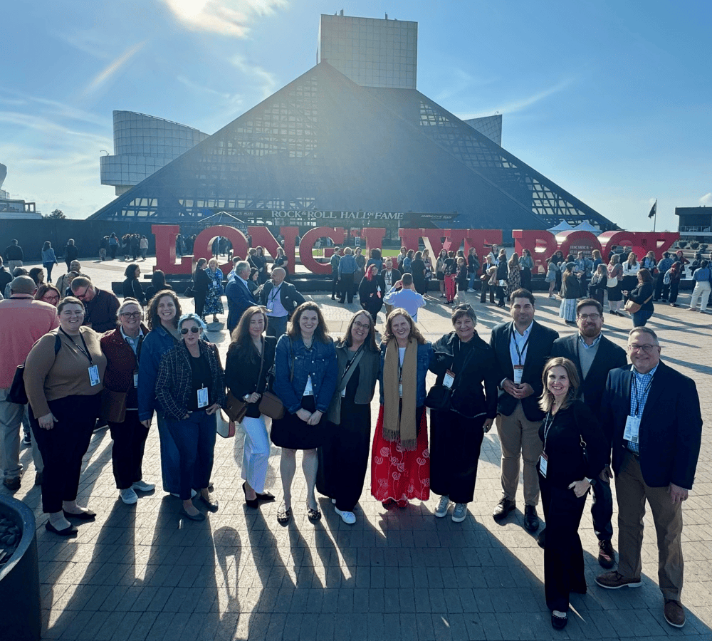 A group of Avalonians and clients outside the Rock & Roll Hall of Fame in Cleveland.