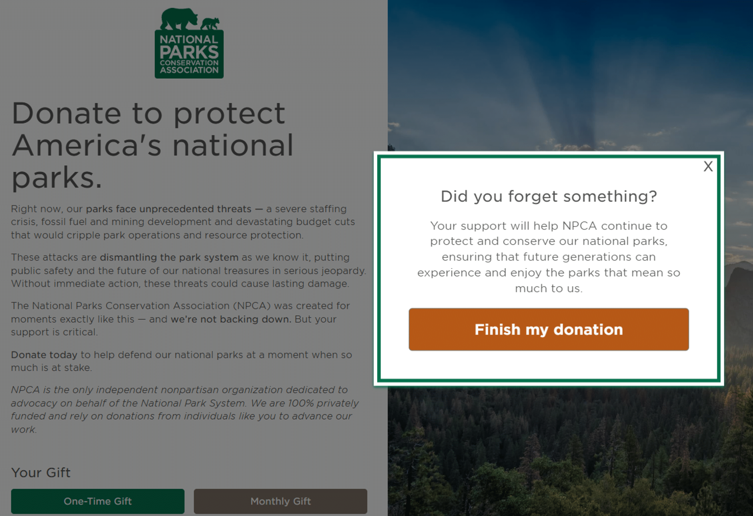 A website pop-up message overlays a donation page for the National Parks Conservation Association, prompting converting visitors to finish their donation and help protect US national parks. The background remains partially visible.