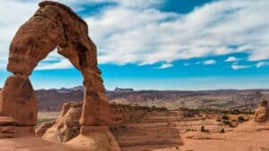 Brown rock formation under blue sky at daytime.